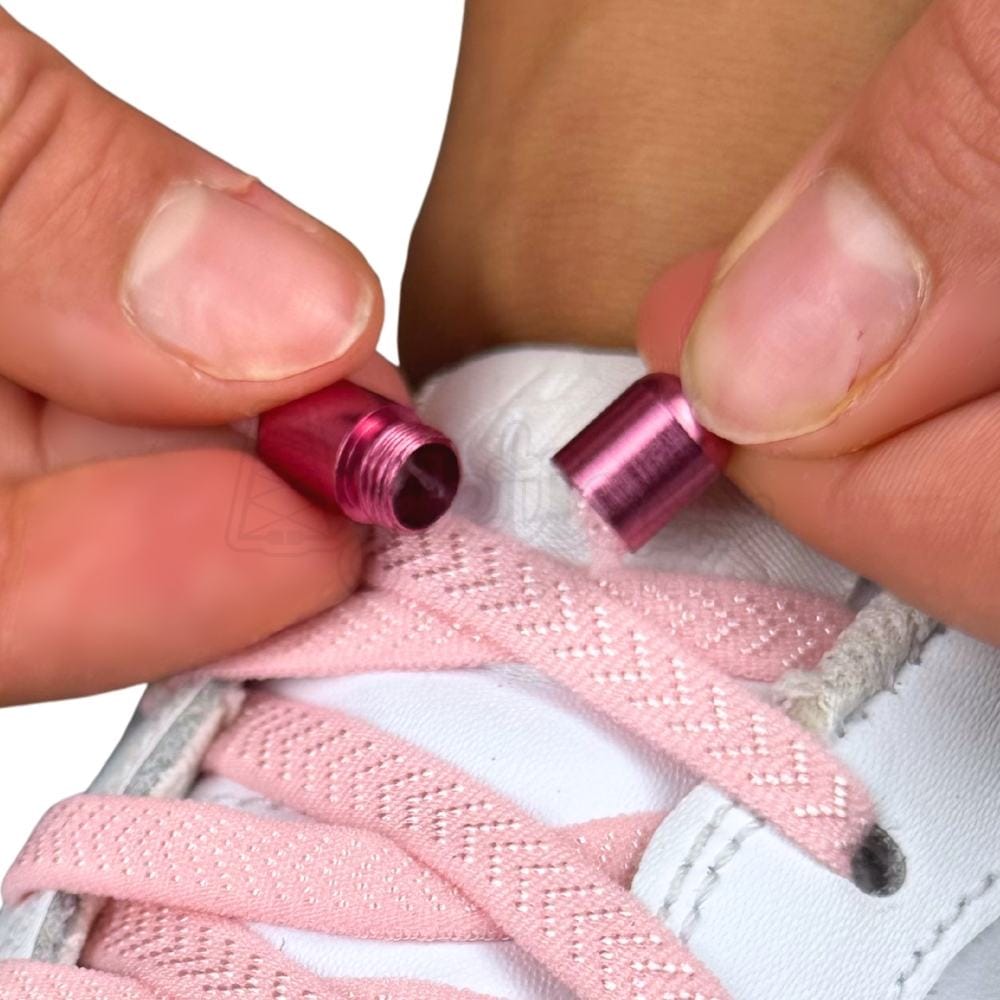 Elastische veters zonder strikken plat 8mm metalen draai capsule roze detailfoto van hoe de sluiting werkt