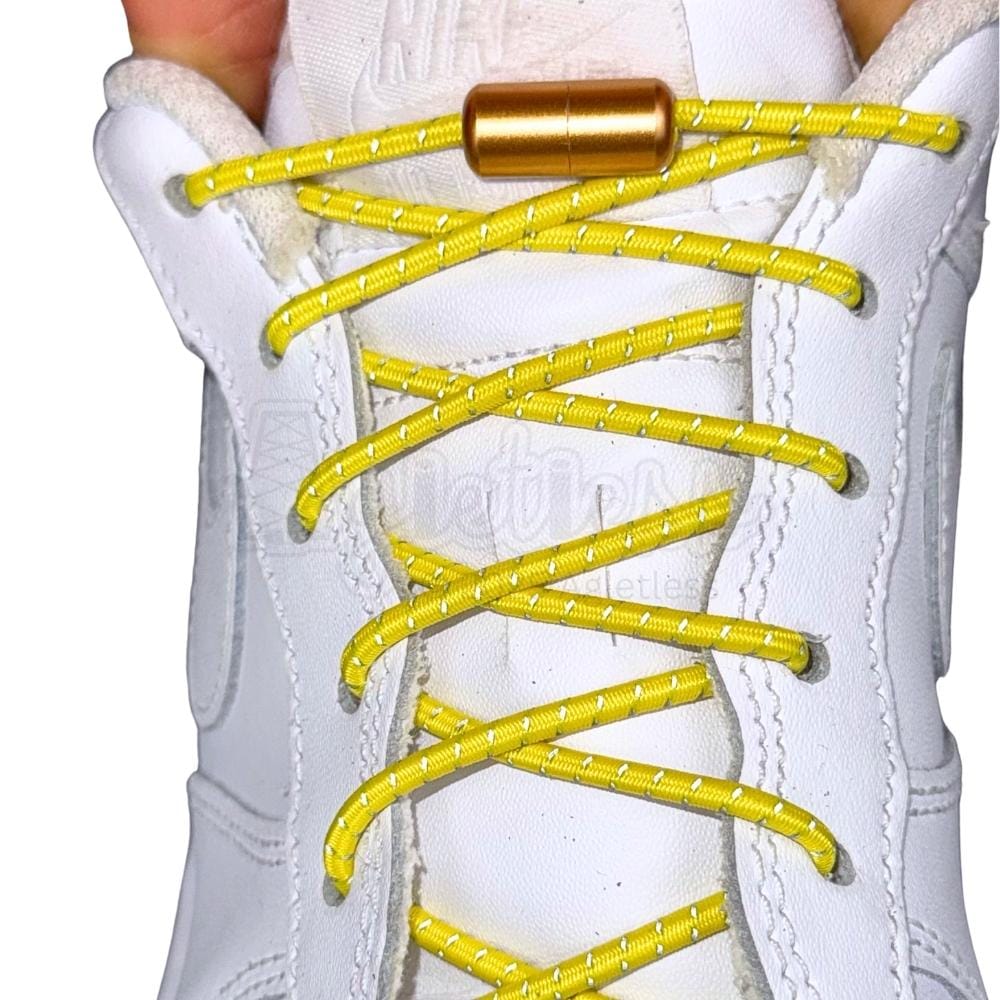 Elastische veters zonder strikken reflecterend 3mm capsule sluiting geel met stretch uitgerekt