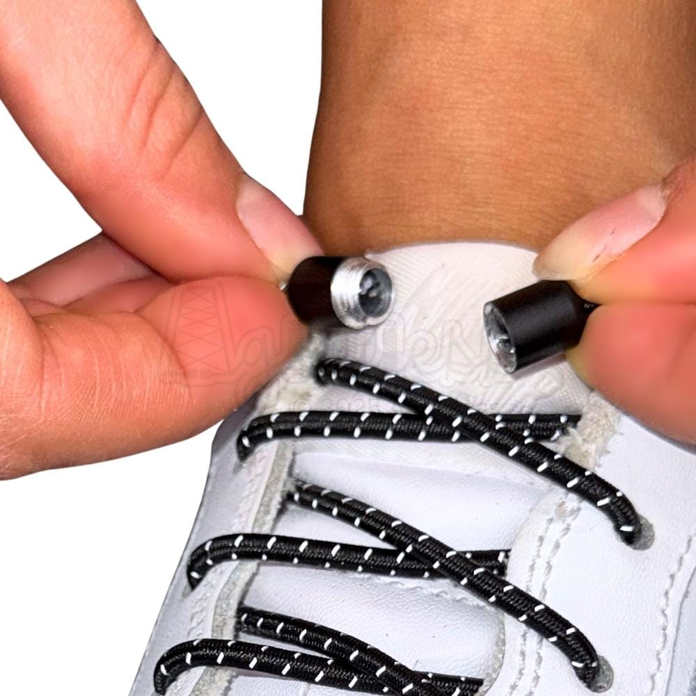 Elastische veters zonder strikken reflecterend 3mm capsule sluiting zwart detailfoto van hoe de sluiting werkt